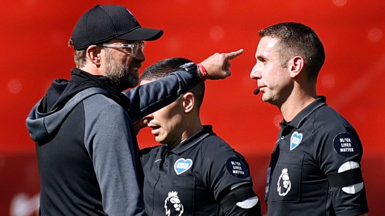 Jurgen Klopp makes his point to David Coote at the conclusion of Liverpool's Premier League clash with Burnley
